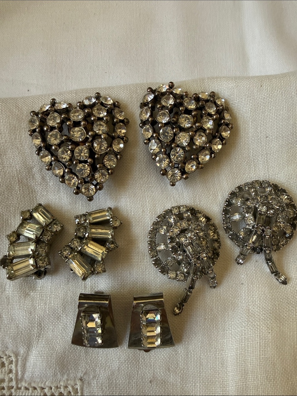 Vintage Retro lot of 4 silver color crystal clip earrings one signed Kramer NY